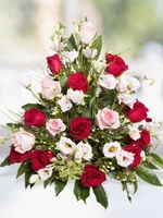 Flower arrangement of red and pink roses