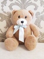 Soft toy teddy bear with bow, dark brown