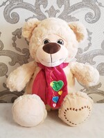Soft toy teddy bear with scarf, light brown